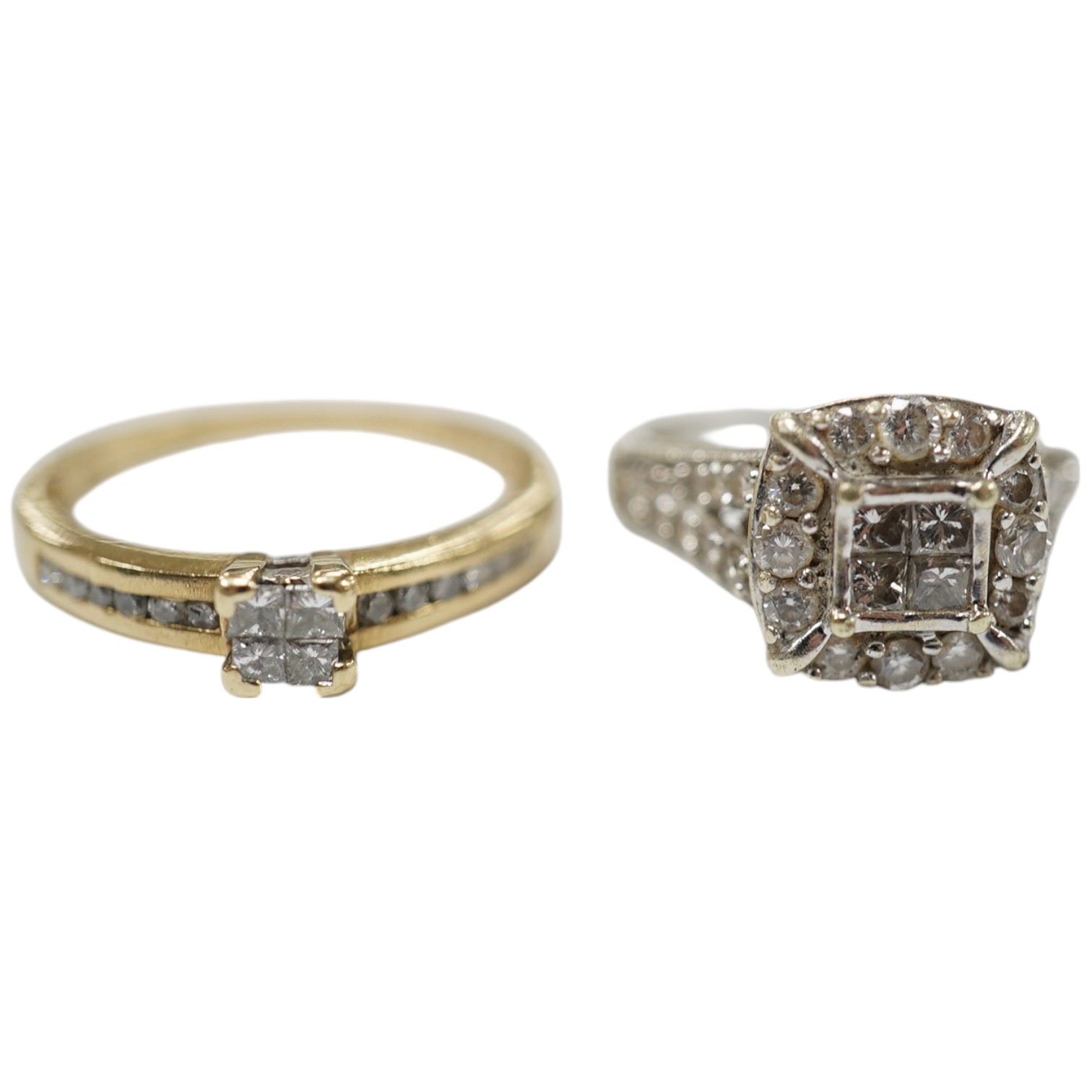 Two modern 9ct gold and diamond cluster set rings, sizes G and M/N, gross weight 4.9 grams. Condition - fair